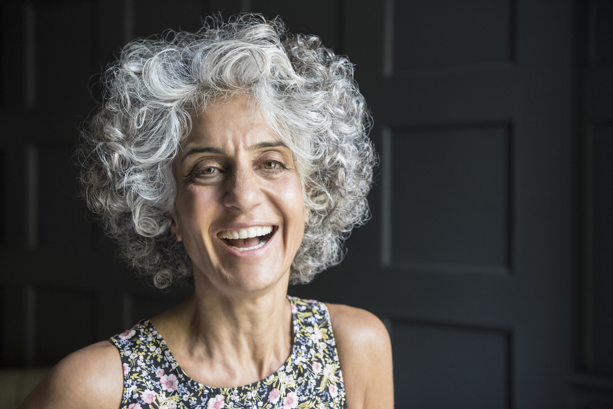 <p>This is a curly style that's shorter on the sides than on the top. "Usually, it's more of a pixie cut than a bob, or somewhere in between," says Abdullah. "If you're over 60, it's a perfect haircut if you have a square or heart-shaped face that has lost some of its definition."</p><p>The curls can bring some angles back to the jaw and chin area, and the curls on top can balance those features by drawing the eye upward. When your strands are naturally gray, they may develop more of a curl, making this style extra flattering.<p><strong>RELATED: <a rel="noopener noreferrer external nofollow" href="https://bestlifeonline.com/over-50-long-hair-news/">10 Ways to Embrace Keeping Your Hair Long After 50</a>.</strong></p></p>