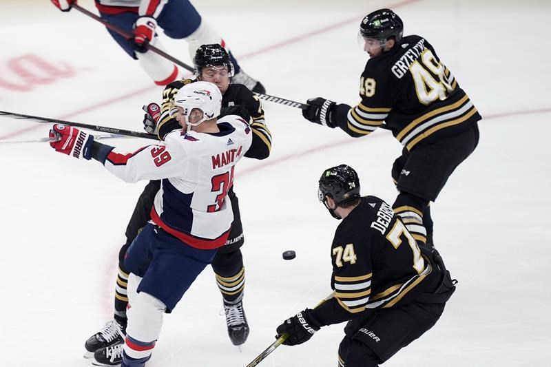 oshie scores as caps end skid with 3-0 win over bruins; ovechkin gets empty netter to pass gretzky