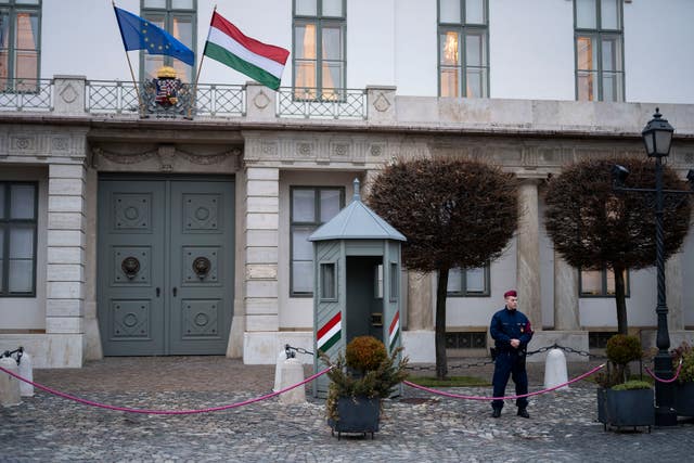 hungarian president resigns over pardon for man convicted of hiding child abuse