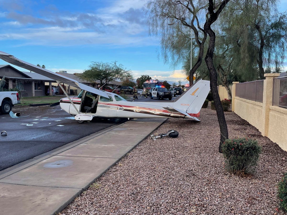 no one hurt when small plane makes crash landing on residential street in suburban phoenix