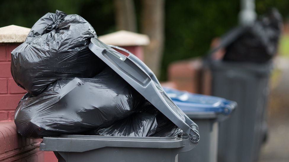 bin bags 'pile up' after waste system delays