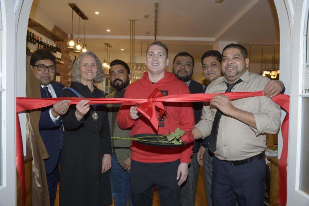 former champion boxer opens new indian restaurant