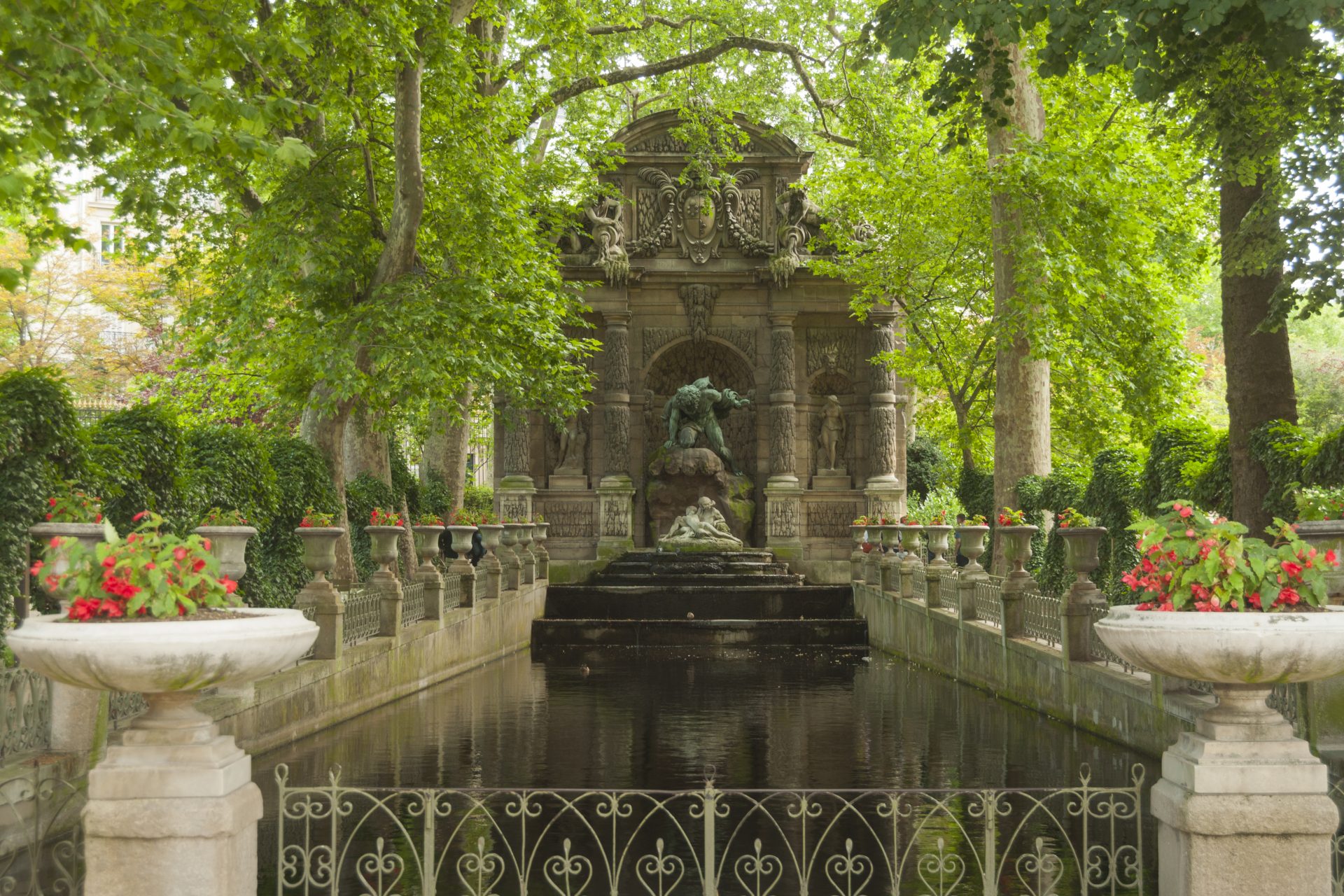 <p>The Luxembourg Gardens is one of Parisians' favorite parks. Wander through its sculptures and flowerbeds before taking a moment to rest in one of its famous green chairs. In the photo, the Medici Fountain, built around 1630, evokes the spirit of the Italian Renaissance.</p>