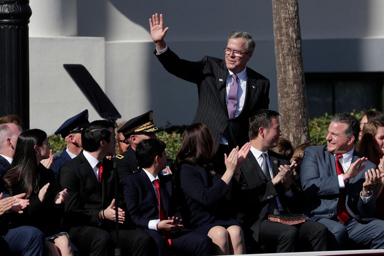Former Governor Jeb Bush waves to the crowd during the 2019 inauguration ceremony on the steps of the Historic Capitol Building in Tallahassee Tuesday, Jan. 8, 2019. Inauguration Day 010819 Ts 065