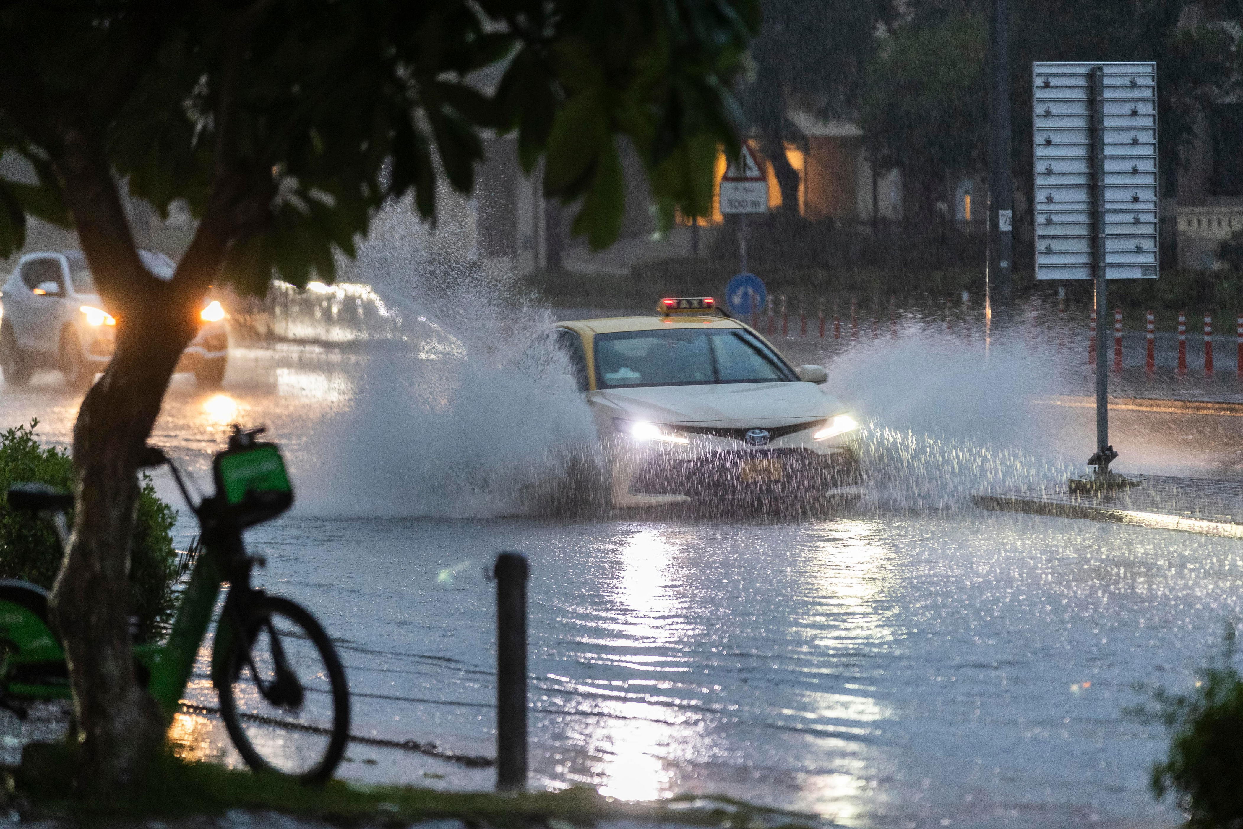 uae weather: widespread flooding after heavy rain, thunder and lightning