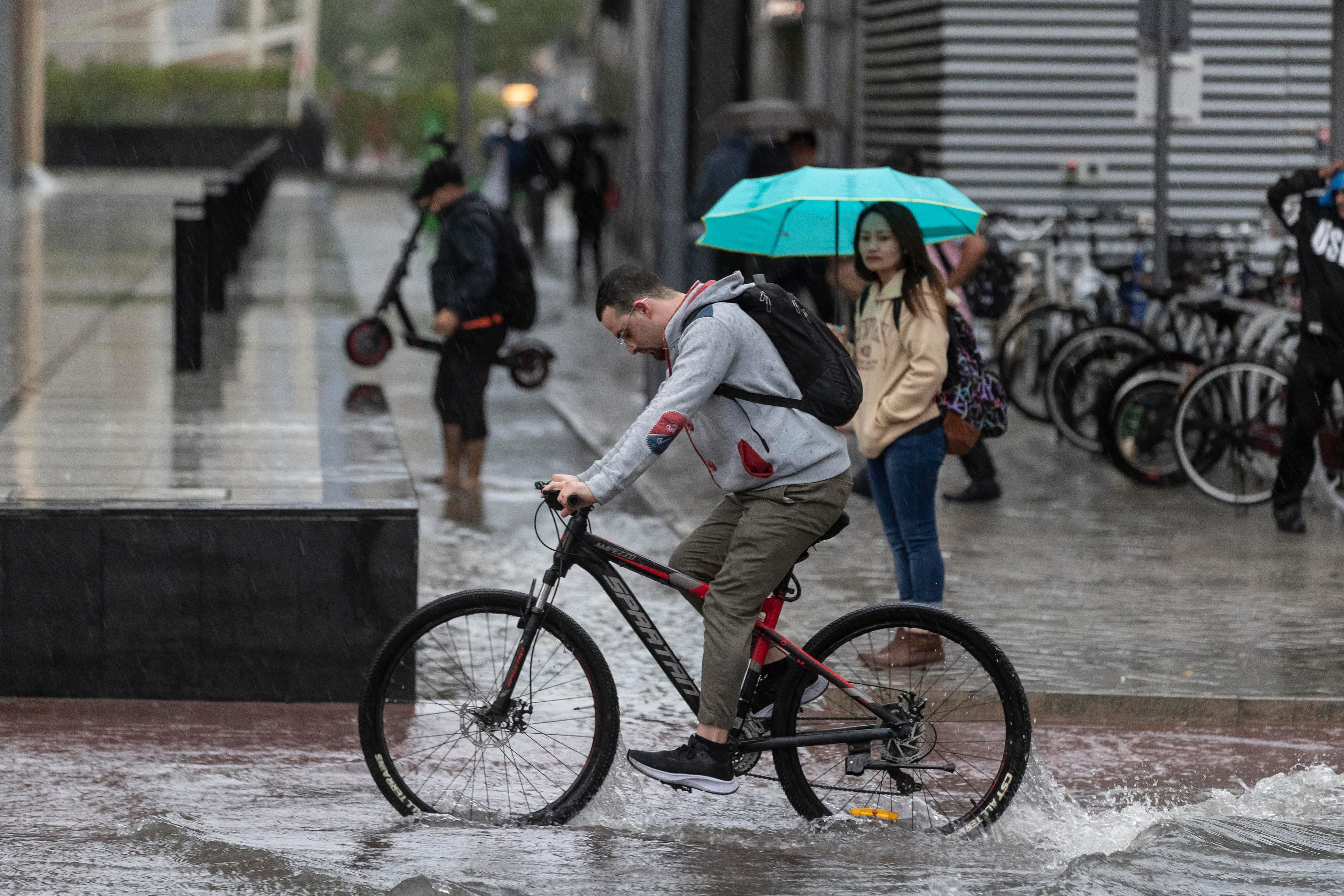 uae weather: widespread flooding after heavy rain, thunder and lightning