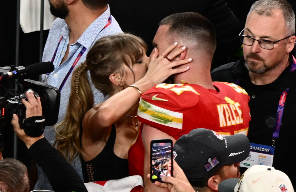 taylor swift seals kansas city chiefs' super bowl victory with passionate kiss for travis kelce