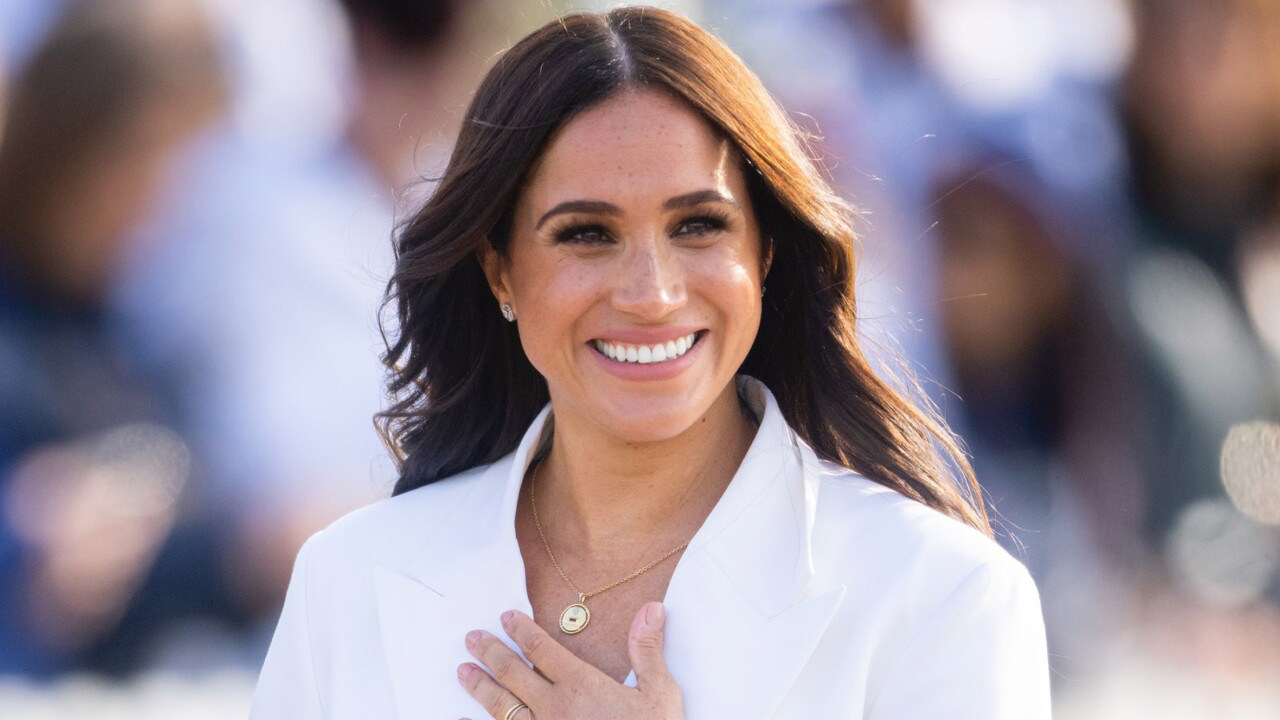 Meghan Markle caught 'beaming' while Prince Harry was visiting King Charles