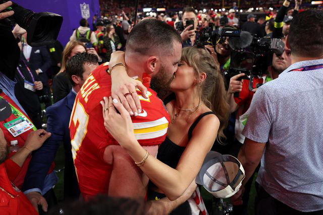 Ezra Shaw/Getty Travis Kelce and Taylor Swift share a kiss after the 2024 Super Bowl