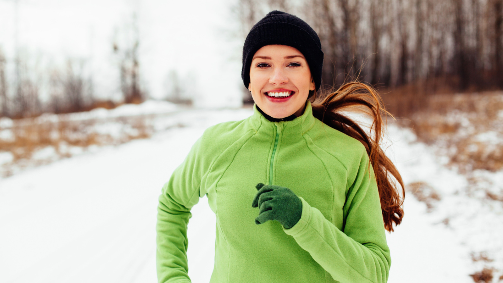 image credit: baranq/shutterstock <p><span>Running on snowy trails is a challenging and exhilarating way to stay fit during winter. The snow adds extra difficulty, making it a great workout. It’s also a serene way to enjoy the beauty of nature during the colder months. Make sure to wear trail running shoes with good grip.</span></p>