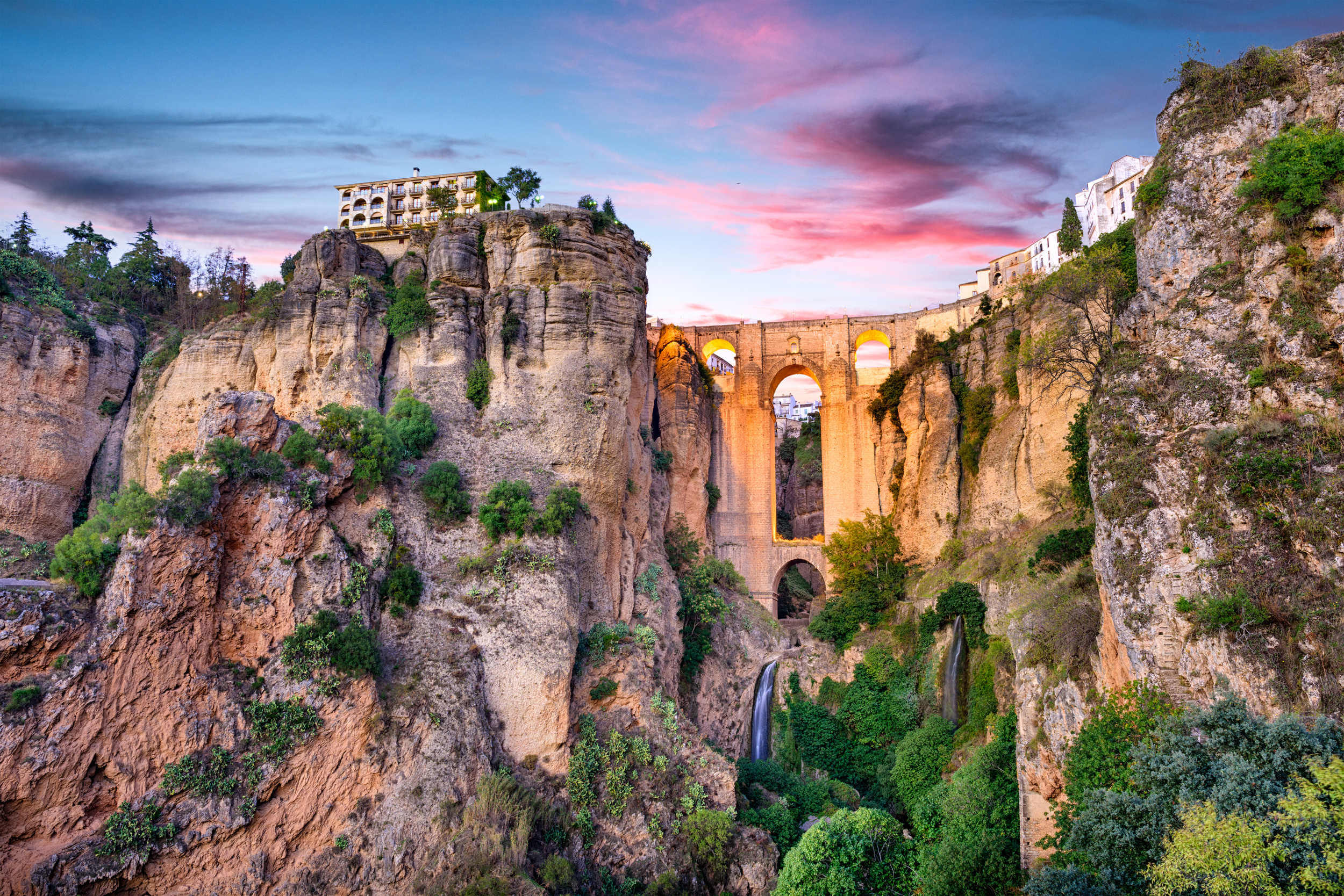 <p>Ronda is a wonderful respite to nearby Malaga. Split by the El Tajo Gorge, the town's dramatic appearance is just one piece of its appeal. Walk the Puente Nuevo, the “New Bridge," and others that connect the two sides of the town. Once you’ve had enough exercise, visit the historic bullring or go wine tasting in the surrounding hillside.</p><p>You may also like: <a href='https://www.yardbarker.com/lifestyle/articles/20_valentines_day_gifts_shell_actually_love_021224/s1__38341527'>20 Valentine's Day gifts she'll actually love</a></p>