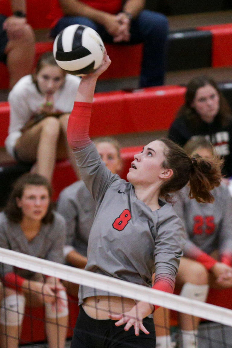 South Newton's Taylor Cripe (8) spikes the ball during the third set of an IHSAA volleyball game, Monday, Oct. 4, 2021 in Chalmers.