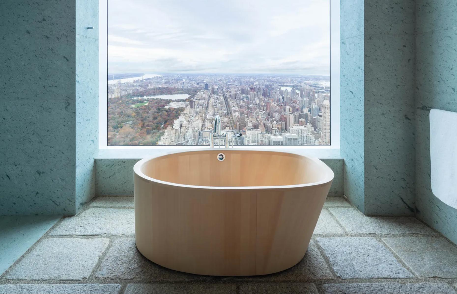 <p>What could be more relaxing than a long soak in this bathtub, which sits on stone tiles that have been sourced from old Kyoto Tram stations? 10-by-ten-foot windows take in dramatic views of Central Park and beyond. Plus, this building attracts the rich and famous, as past residents have included Jennifer Lopez and Alex Rodriguez, who sold their apartment here in 2019 for $15.8 million. </p>  <p><strong>Liked this? Click on the Follow button above for more great stories from loveMONEY</strong></p>