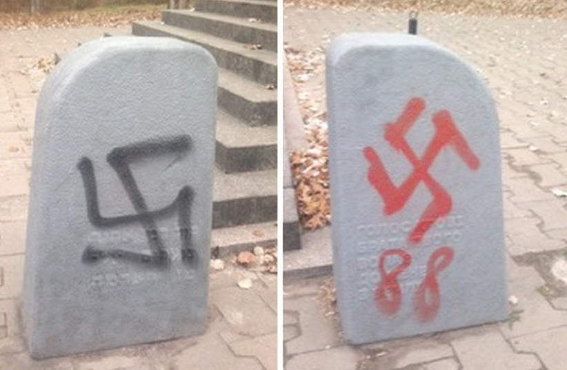 holocaust memorial stones splattered with paint in vienna