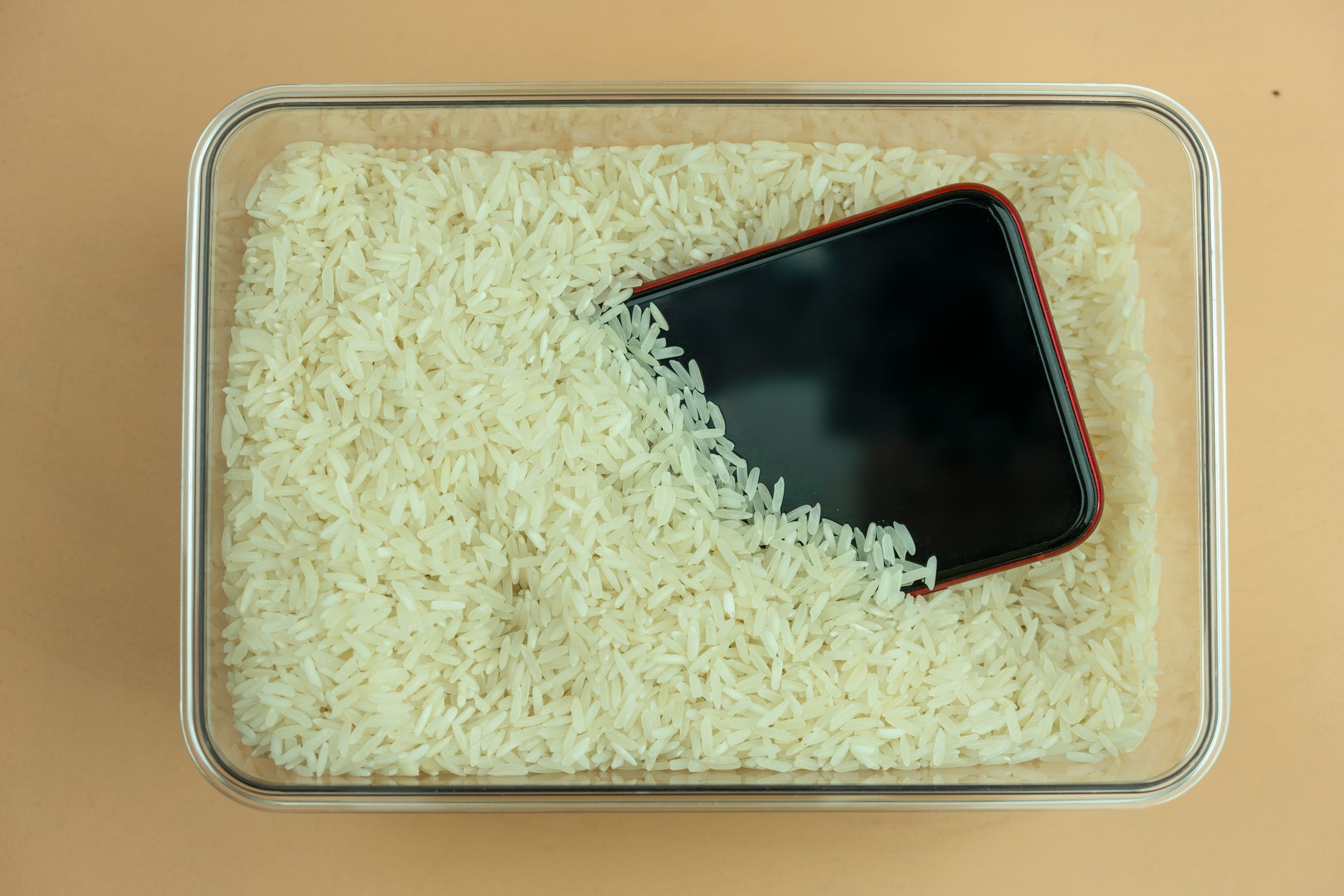 don't dry your damp iphone in a bowl of rice, apple says