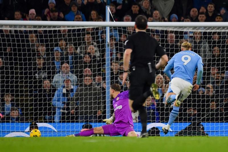 nathan collins dropped as man city dig deep to prevail