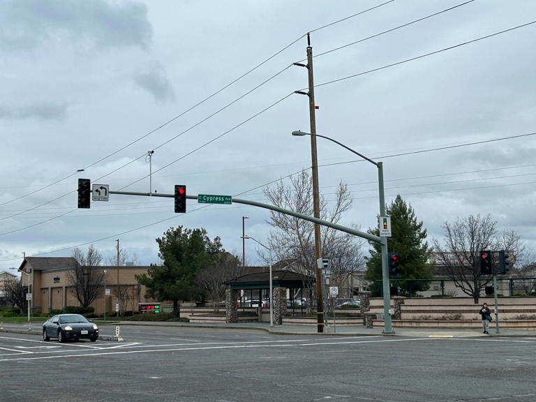 Which two Redding intersections are getting red-light traffic cameras?