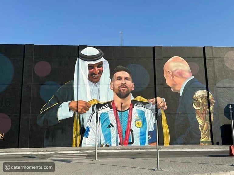a giant mural of the emir of qatar and messi unveiled in al wakra