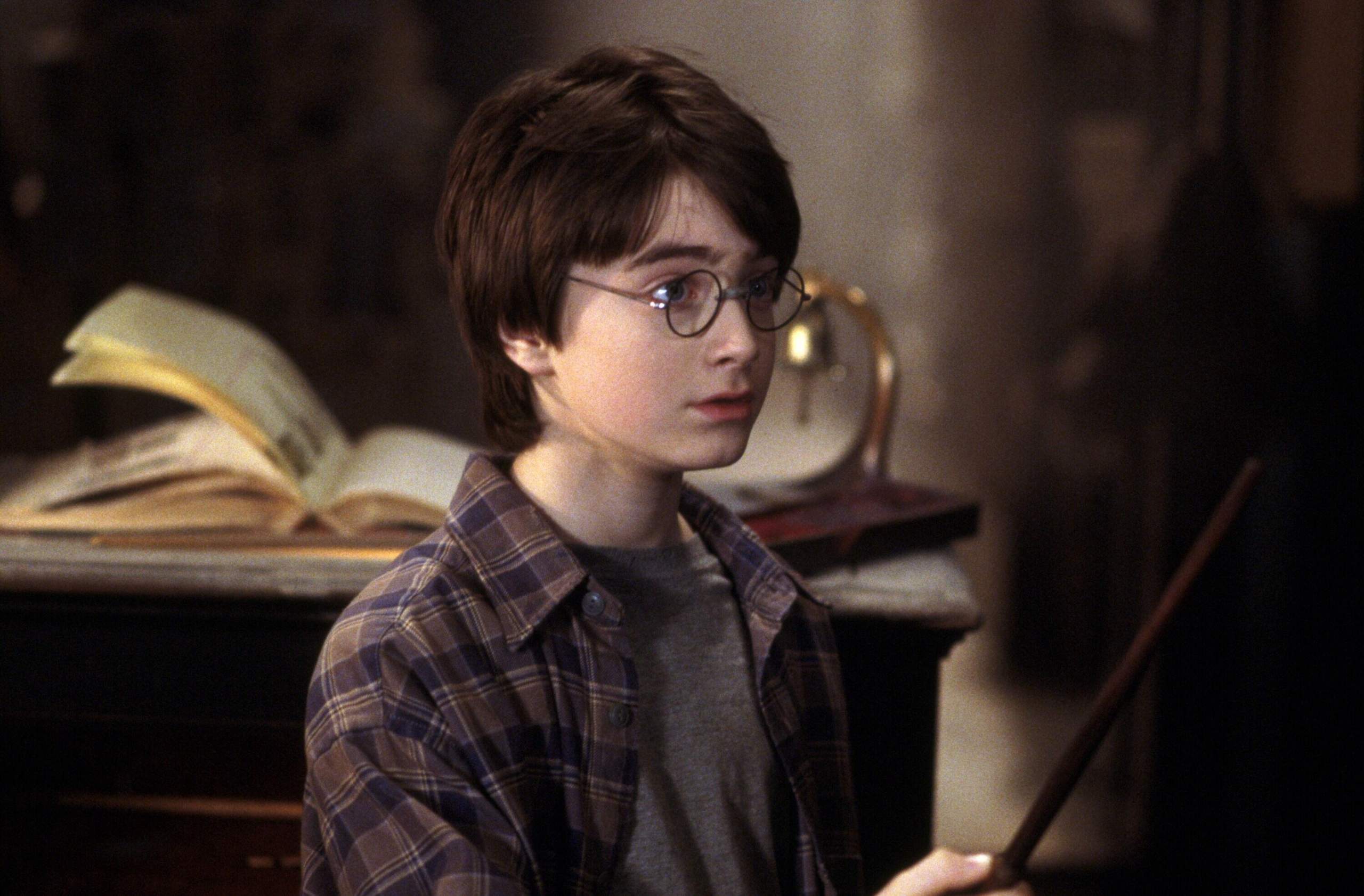 Daniel Radcliffe was a bit of a wild child on set during the filming of the movies. This was particularly the case when he was a younger child. Through the course of filming eight films, Radcliffe went through 160 pairs of glasses. In the process, he reportedly broke nearly 80 different wands. <br> <br> In the novels, Harry is portrayed as having buck teeth and green eyes. However, on-screen, neither ended up occurring. Green contacts were initially used on Radcliffe. However, he endured an eye allergy -- and thus production scrapped the plans for the authentic eye color. As such, you're seeing him on-screen with his natural eyes.