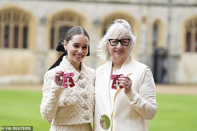 games of thrones star emilia clarke is joined by her mother as she's given gong by prince william at windsor castle for setting up brain injury charity - as spoons boss tim martin and sajid javid are knighted