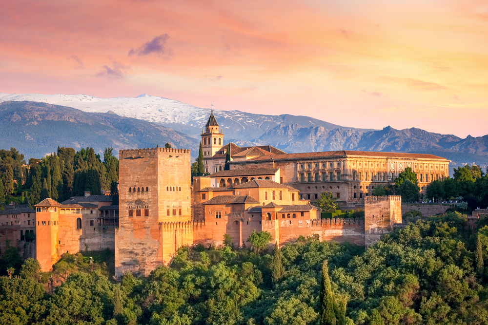 <p>This impressive fortress is perched high above the city of Granada. Construction on The Alhambra first began in 1238,<strong> during the Islamic Naṣrid dynasty</strong>. </p>  <p>Over the years, the palace grew to include a <em class="Highlight htbd83152e-bb7b-47ce-96de-a16669c66ac1">military</em> base, a wing for the royal family, and a wing for members of the royal court.</p>