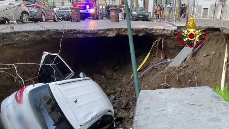 huge sinkhole in naples swallows two cars