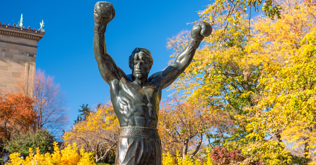 <p> The Rocky Statue and steps (the Philadelphia Museum of Art steps Rocky famously runs up in the films) are a big draw for visitors to Philly. The statue, which depicts the film’s protagonist Rocky Balboa with boxing gloves raised in the air, makes for a great photo op. </p>
