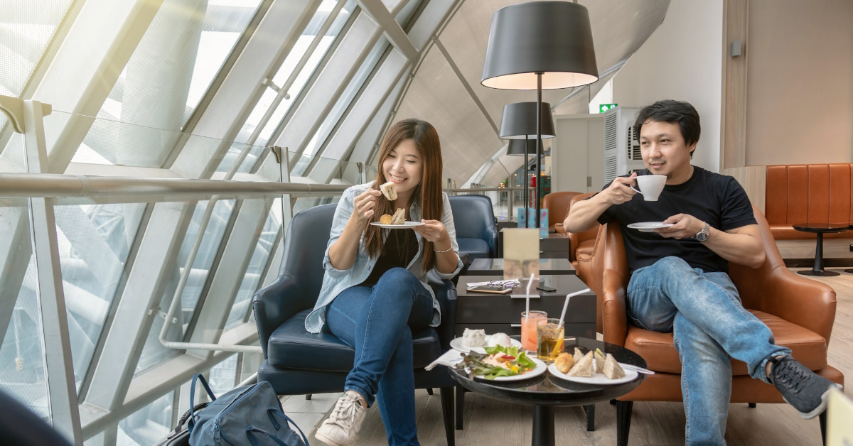 <p> First-class travel is about more than sitting in a premium seat; it’s also about elevating the actual airport experience. </p> <p> To avoid sitting in loud and busy airport waiting areas, look into getting complimentary airport lounge access with your credit card. Depending on the lounge, you could enjoy free food and drinks while relaxing in a more comfortable setting. </p>