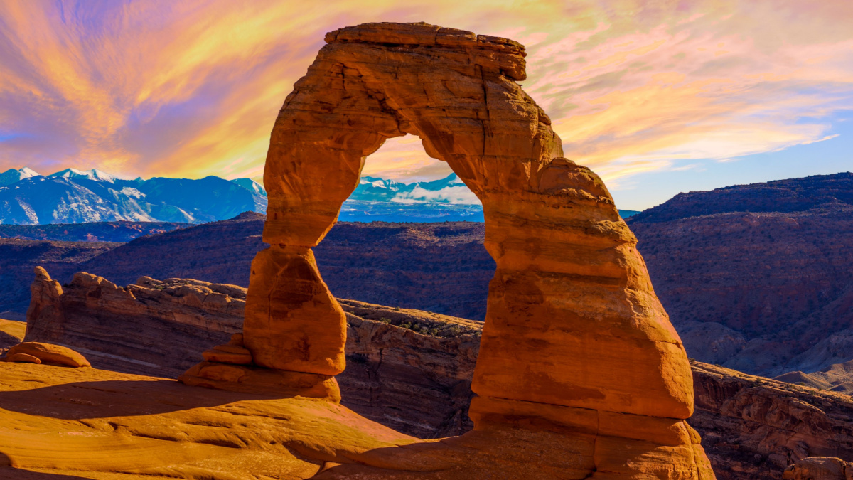 <p>Most of southern Utah is a massive and spectacular sandstone wilderness, but Arches is especially exceptional. Among the red sandstone towers and cliffs, there is the world’s largest concentration of natural arches, some of which you walk under or through.</p>