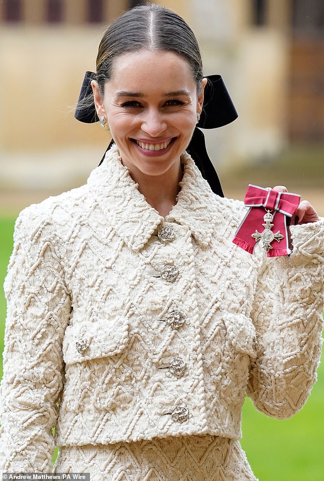 games of thrones star emilia clarke is joined by her mother as she's given gong by prince william at windsor castle for setting up brain injury charity - as spoons boss tim martin and sajid javid are knighted