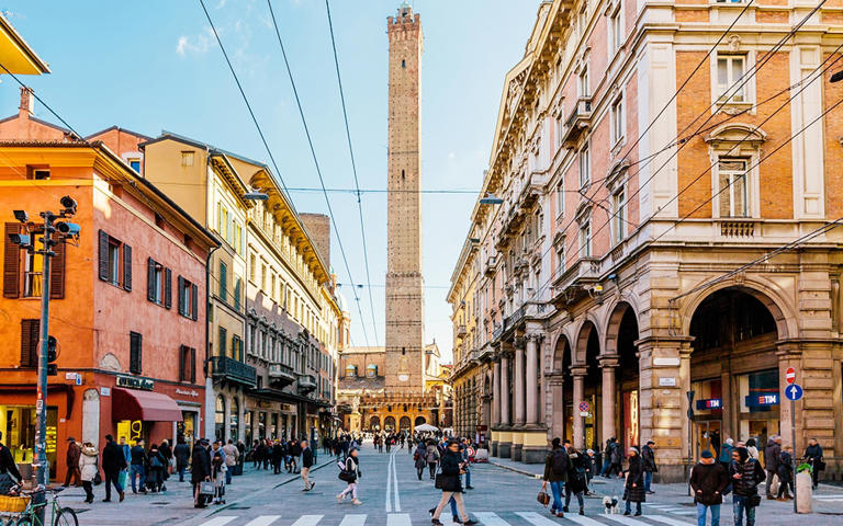 The slightly leaning Asinelli Tower is one of the best things to do in Bologna - Alexander Spatari/Alexander Spatari