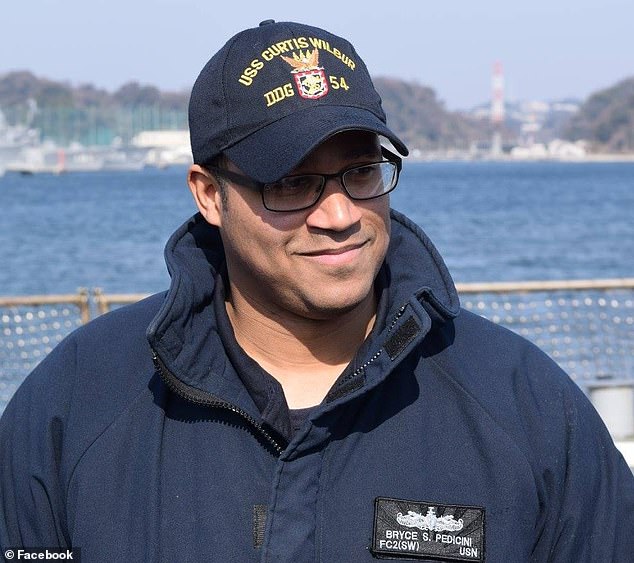 us navy chief based in japan charged with espionage and sharing classified documents with a foreign citizen after 'secretly smuggling files out from secure places'