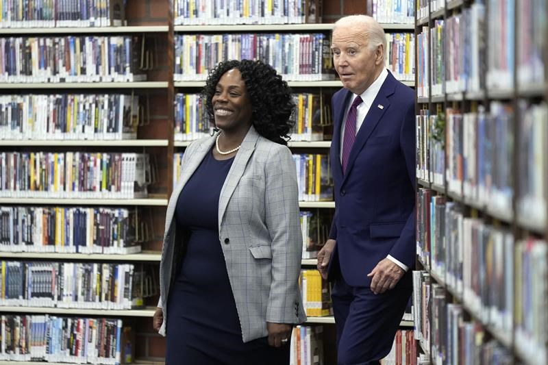 biden says too many americans are saddled with school debt as he cancels federal loans for 153,000
