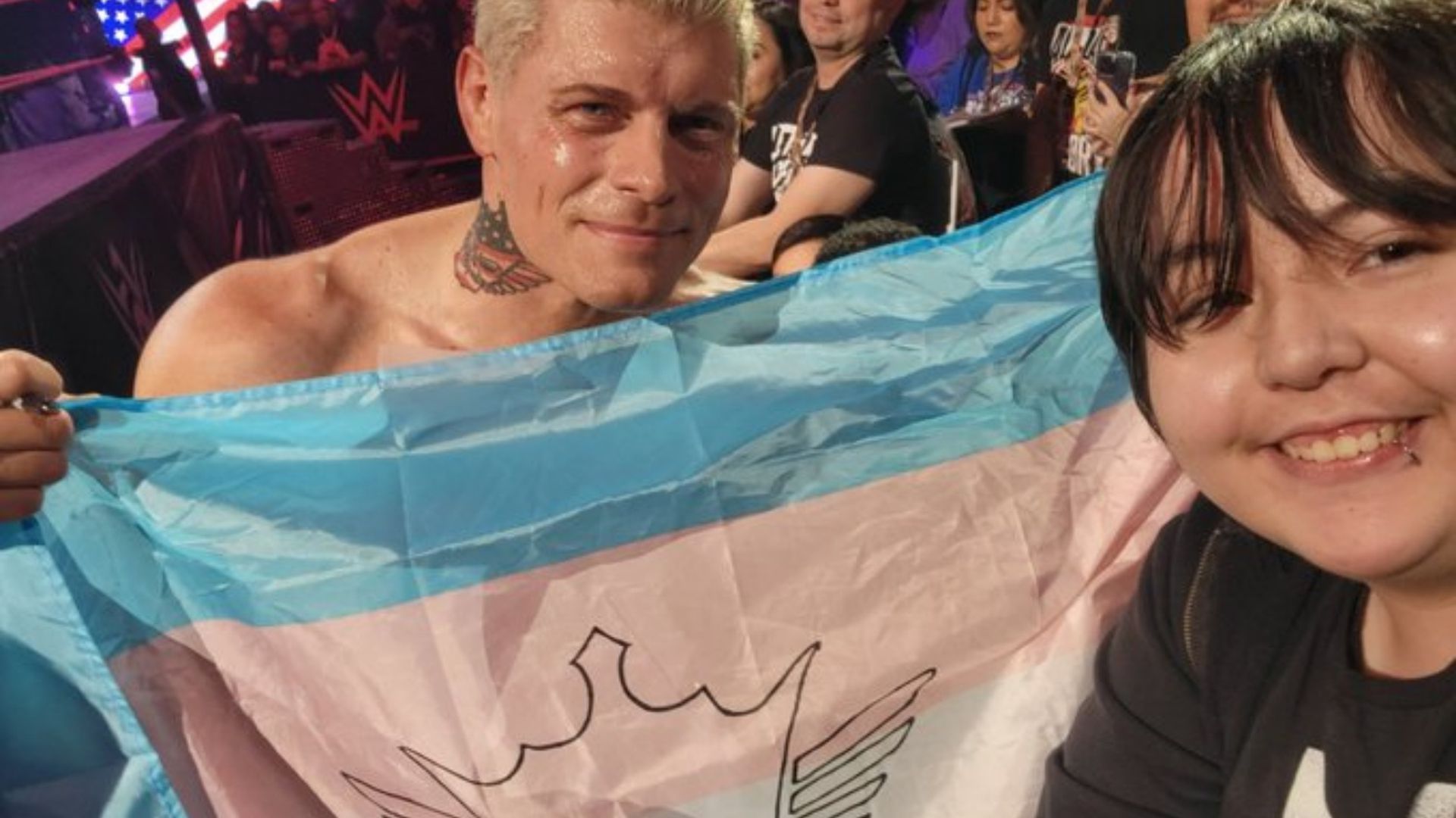 wwe star cody rhodes celebrates trans fan with customized trans pride flag
