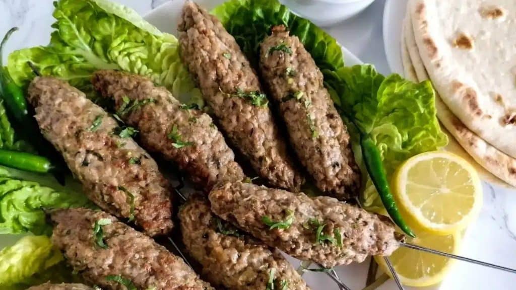 <p>Enjoy the sizzle of Chicken Seekh Kabab: a fiery, tender blend of minced chicken grilled to perfection on skewers. Perfect as an appetizer, these succulent kababs pair wonderfully with fluffy naan and a tangy tomato chutney kick. A must-try treat!</p><p><strong>Get the recipe:</strong> <a href="https://soyummyrecipes.com/chicken-seekh-kabab/">Chicken Seekh Kabab</a>.</p>