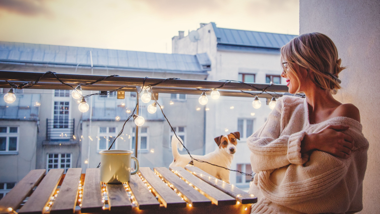 image credit: Masson/Shutterstock <p><span>Soft, ambient lighting can work wonders in creating a serene balcony space. Consider string lights, lanterns, or LED candles to provide a warm, inviting glow. These lights illuminate the space gently and add a cozy, magical feel, perfect for evening relaxation.</span></p>