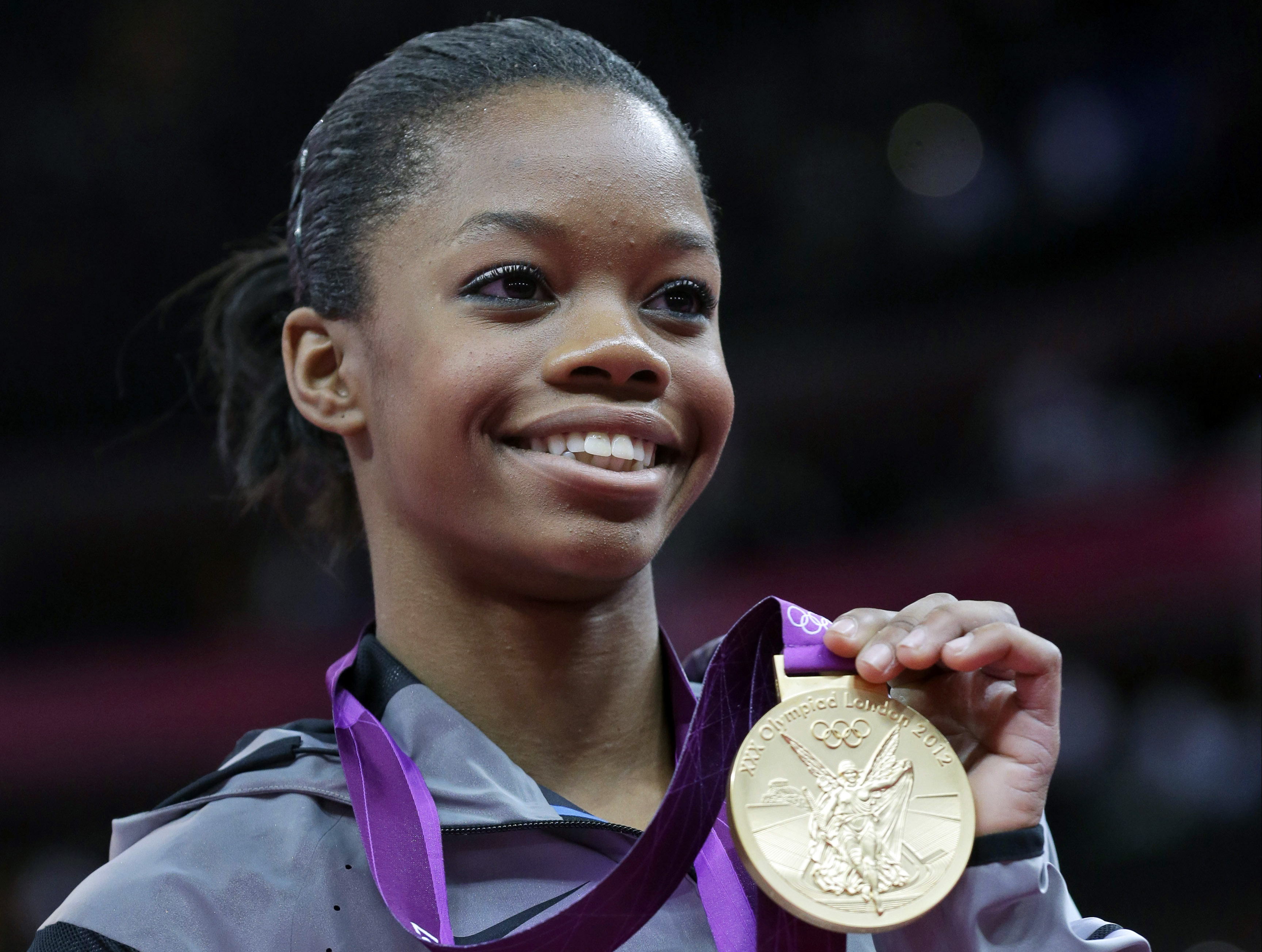 olympic gold medalist gabby douglas withdraws from first meet in 8 years due to covid-19