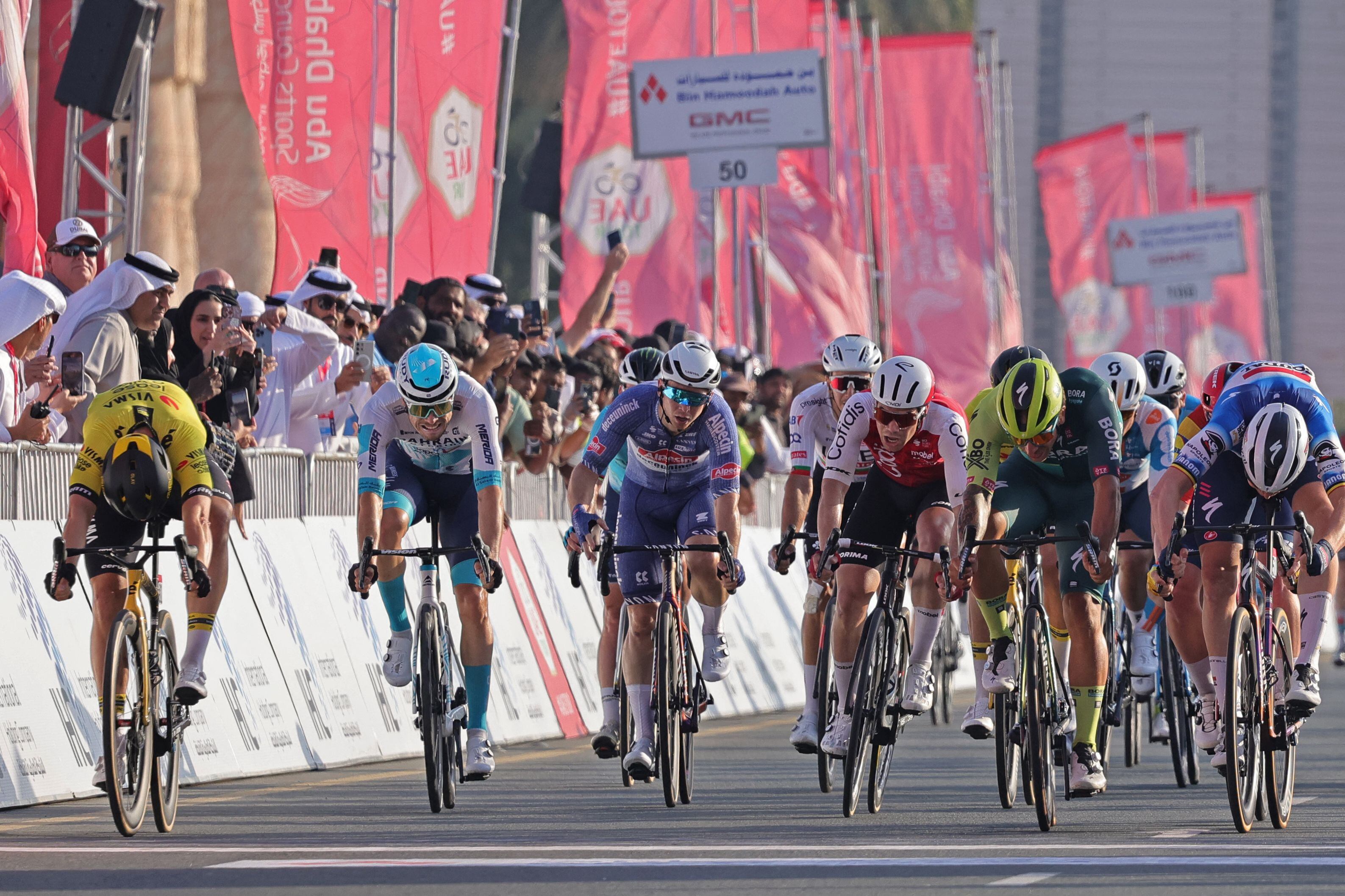 olav kooij pips tim merlier in photo finish to win stage 5 of uae tour