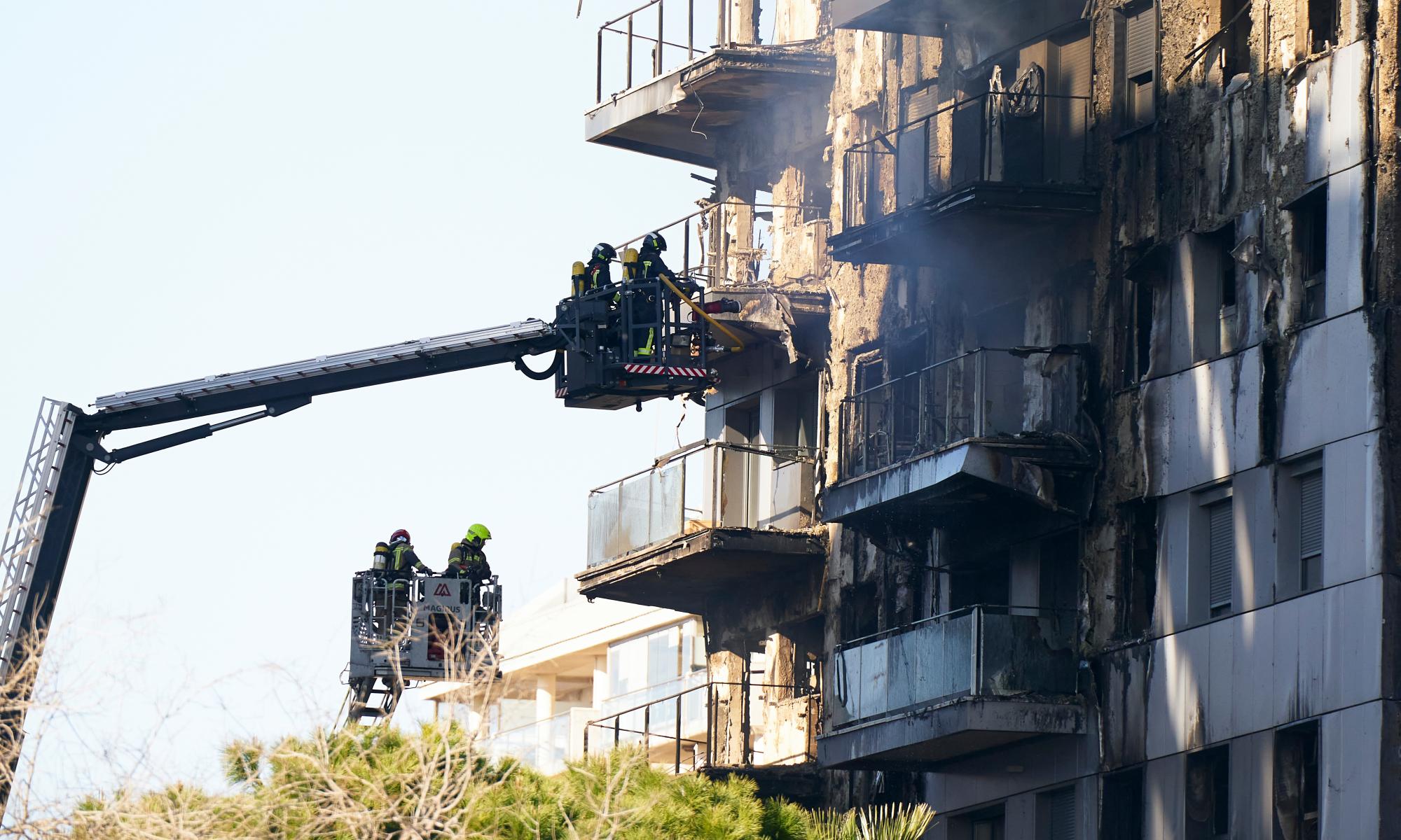 spain fire: up to 15 people still missing after valencia apartment block blaze