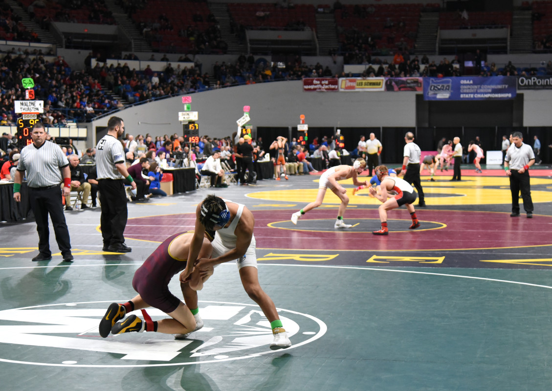 oregon high school wrestling state championships: newberg (6a), thurston (5a, 6a/5a girls) hold overnight leads