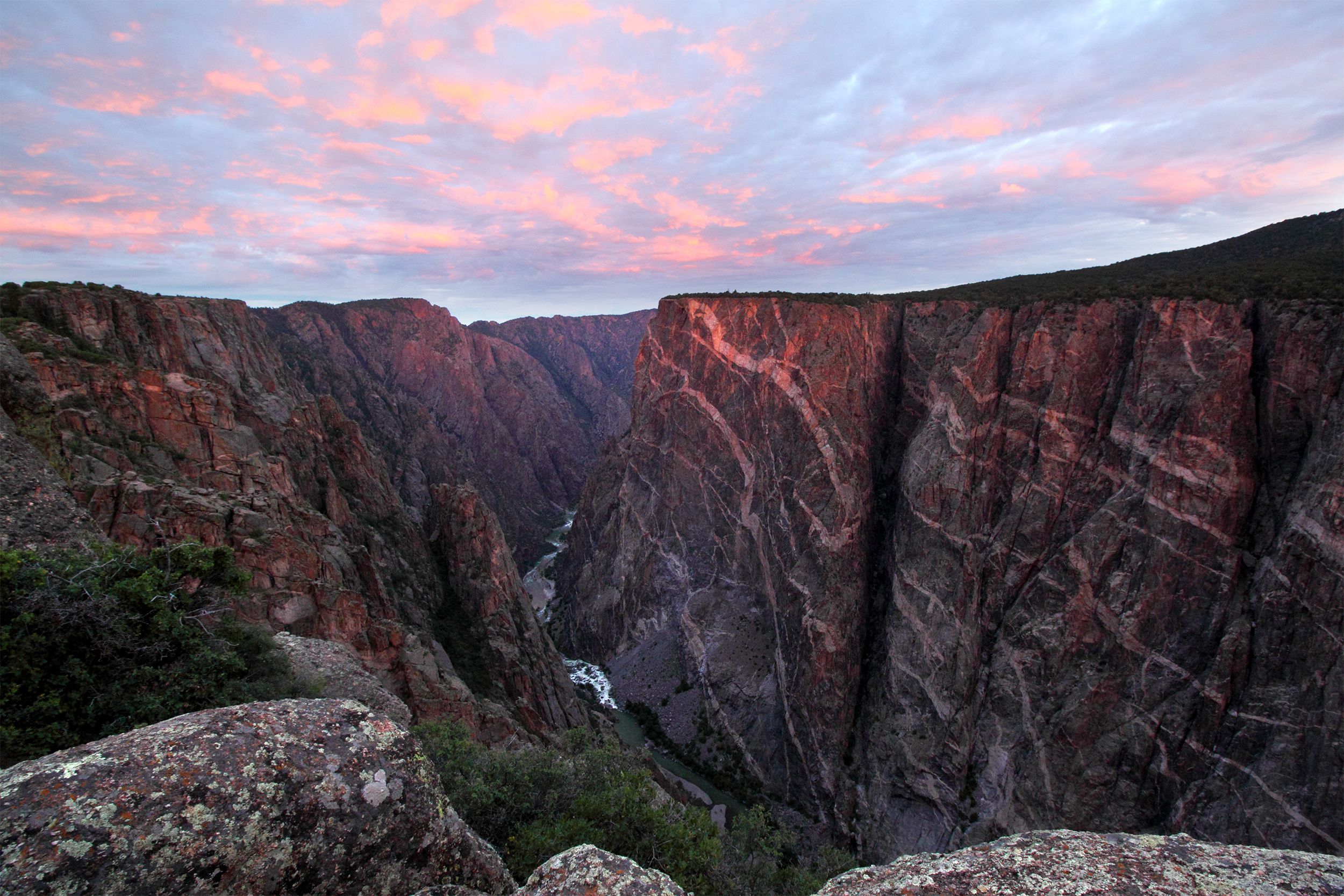 <p>Get ready for steep cliffs and craggy spires at <a href="https://www.nps.gov/blca/index.htm">Black Canyon of the Gunnison National Park</a>. A vertical rock wilderness, the canyon offers a place for visitors to hike, take scenic drives, rock climb, and go kayaking. Night sky viewing opportunities are also popular here. </p><p><b>Related:</b> <a href="https://blog.cheapism.com/national-park-photos-snow/">Awe-Inspiring Photos of National Parks in Winter</a></p>