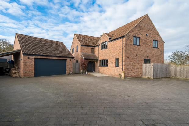 modern, red-brick residence on a three acre plot on the fringes of langport