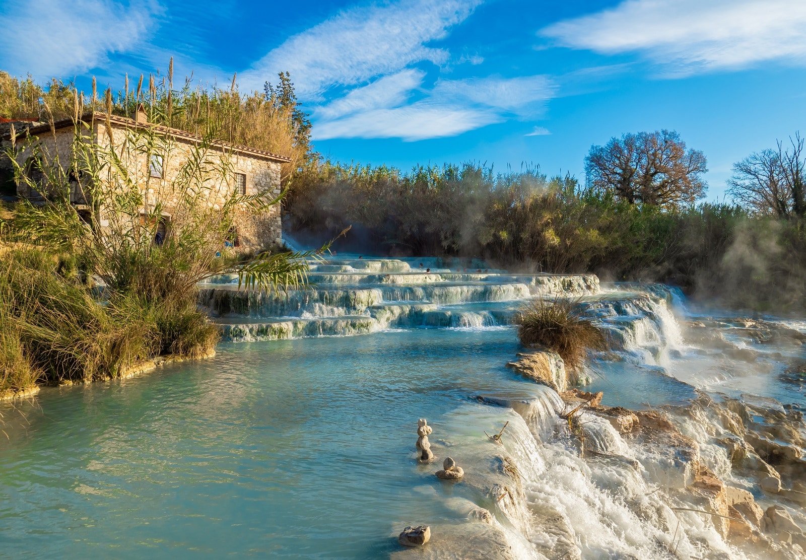 <p><span>In the heart of Tuscany, Italy, lies Terme di Saturnia, a spa resort renowned for its thermal springs that date back to ancient times. These sulfuric waters, naturally heated to a warm 37.5°C, are believed to have therapeutic properties, particularly for skin and rheumatic ailments.</span></p> <p><span>T</span><span>he resort offers a luxurious spa experience with a range of treatments, including mud therapy, hydrotherapy, and aesthetic medicine. Beyond the spa, guests can enjoy the stunning Tuscan landscape, with its rolling hills, vineyards, and medieval villages. The resort’s focus on wellness extends to its cuisine, offering dishes prepared with local, organic ingredients.</span></p> <p><b>Insider’s Tip: </b><span>Explore the nearby medieval village of Saturnia, with its charming streets and historical architecture.</span></p> <p><b>When To Travel: </b><span>Spring and autumn are ideal for visiting, offering pleasant weather and fewer crowds.</span></p> <p><b>How To Get There: </b><span>The nearest major airport is in Rome, from which Terme di Saturnia is a two-hour drive.</span></p>