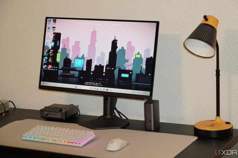 The Alienware QD-OLED 27 monitor as part of a desk setup.