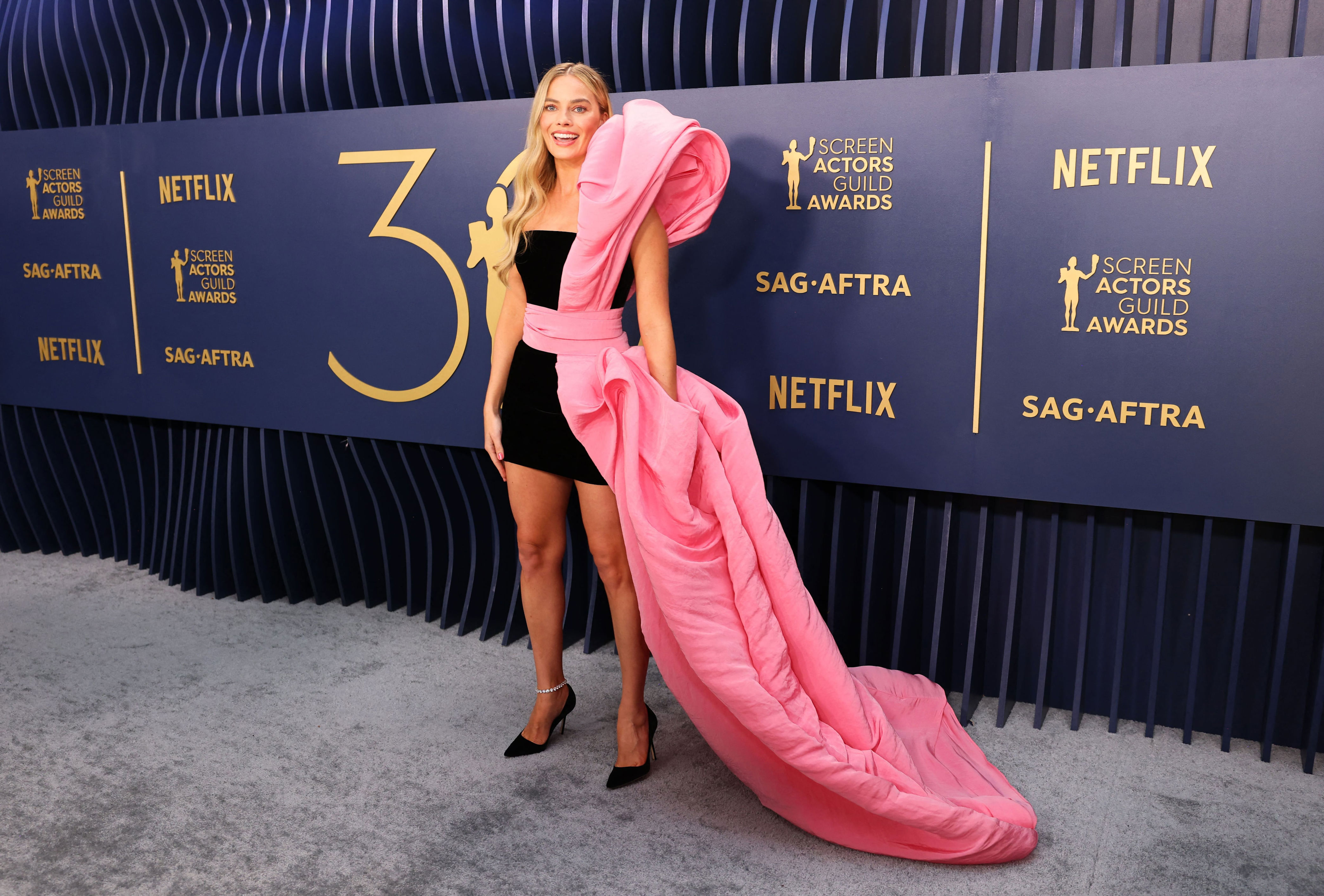 sag awards fashion: movie and tv stars swap picket signs for red carpet looks