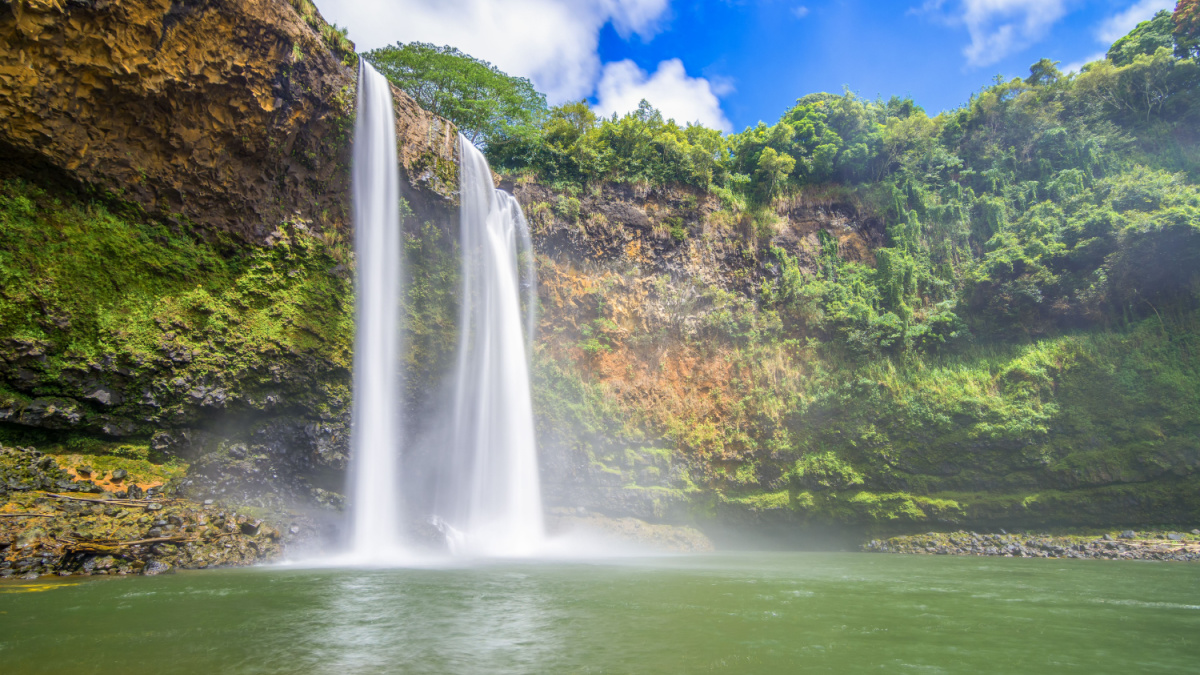 <p>Many people cite Kauai as the most beautiful of the Hawaiian islands, and many of those pick Wailua as their favorite waterfall. The river here splits into twin drops that fall 173’.</p>