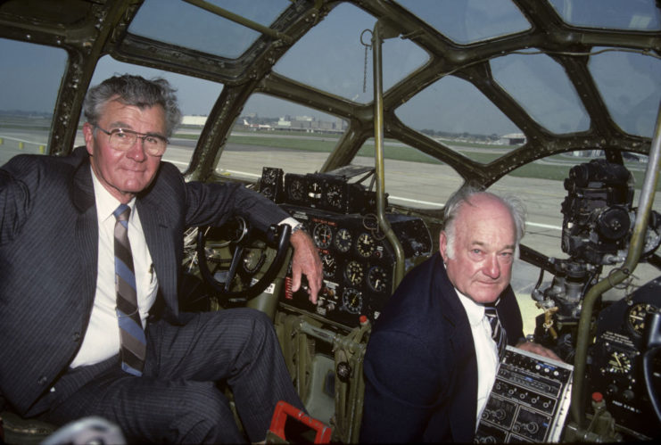 Brig. Gen. Paul Tibbets and bombardier Tom Ferebee in the cockpit of the <a>Enola Gay</a> , 1981. (Photo Credit: Ben Martin / Getty Images)