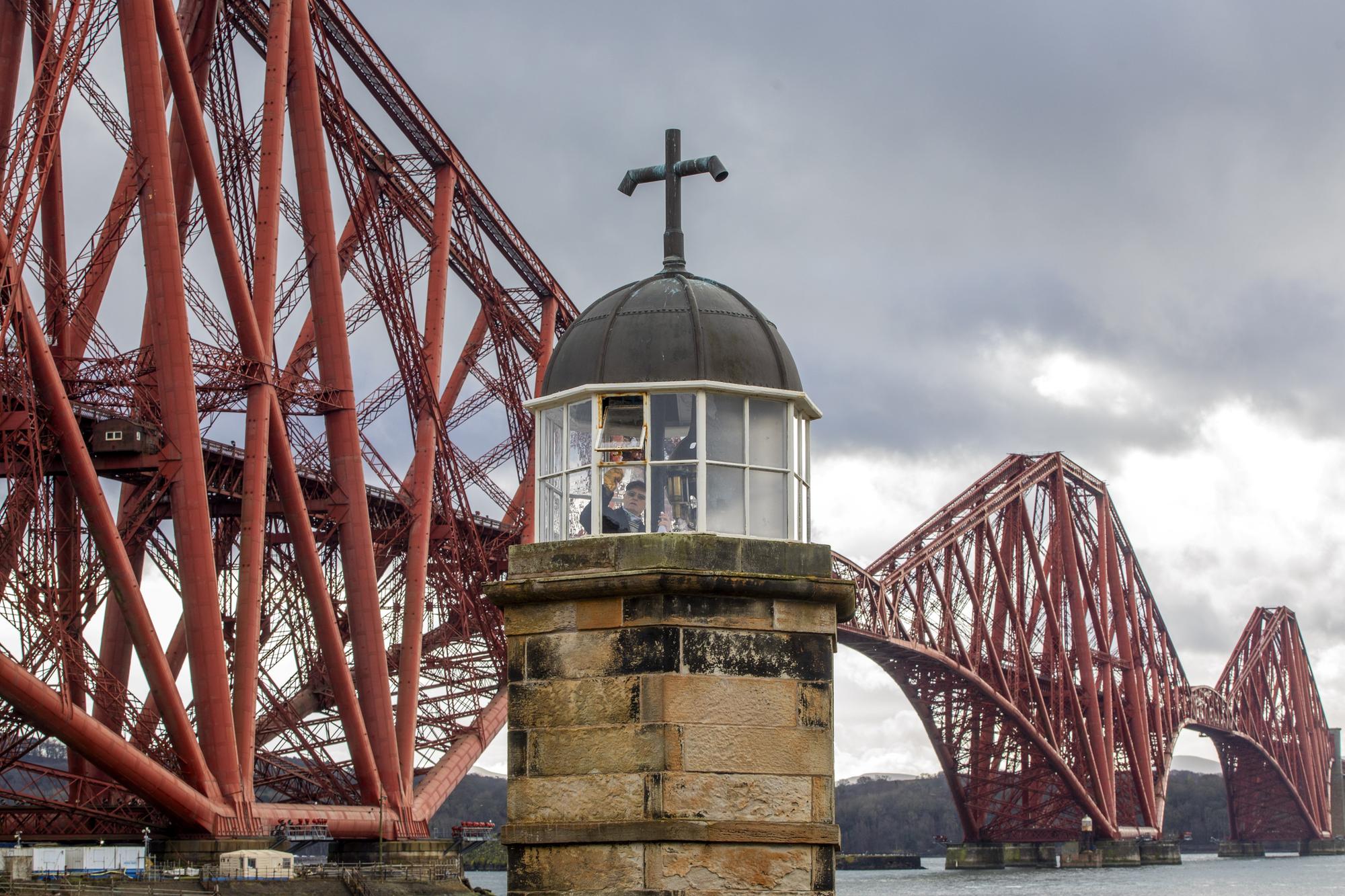 inside the world's smallest working 'lighthouse' in the forth which can shine for three miles and is powered by vegetable oil