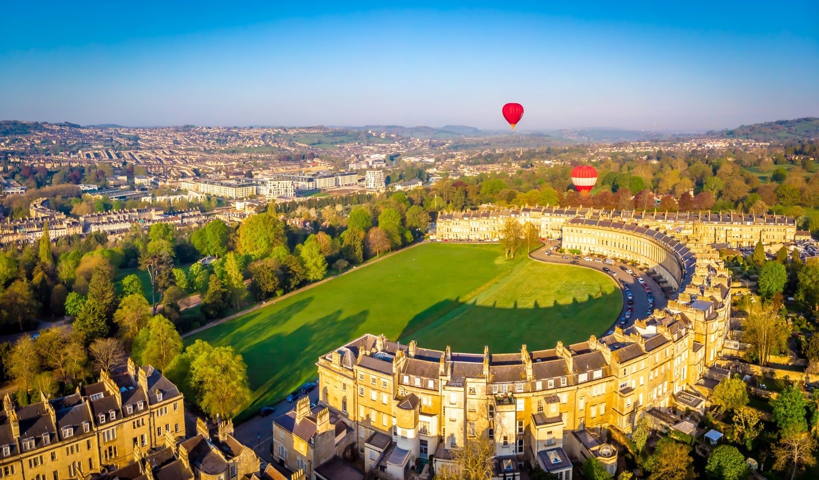 <p><span>Bath, known for its Roman heritage and Georgian architecture, offers a journey through different eras of English history. The Roman Baths complex, remarkably preserved, provides a window into ancient leisure and social practices.</span></p> <p><span>The Royal Crescent, a striking example of Georgian architecture, epitomizes the city’s 18th-century elegance. Bath has many historical landmarks and offers modern-day luxuries like thermal spas, boutique shopping, and a vibrant cultural scene, all while maintaining its historical charm.</span></p>