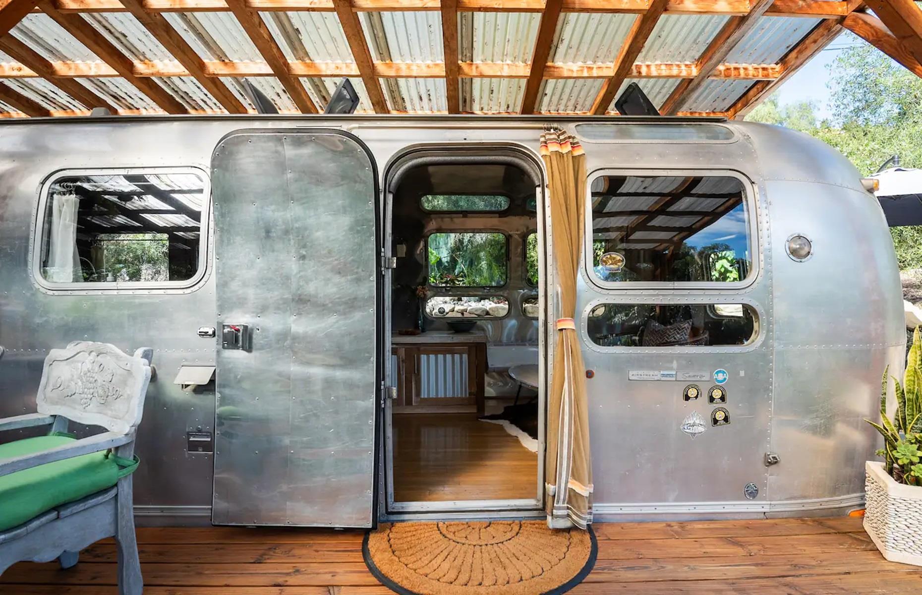 <p>Delia bought the 33-foot Airstream in 2017 and it was in a sorry state. In fact, while transporting it on a tow truck to her property, she had to stop twice just to make sure it was still in one piece.</p>  <p>Delia then spent the next few years renovating the Airstream as and when she could afford to and her main goal was to make it comfortable for her guests. Inside, the structure of the Airstream shines bright, with its shimmering, slightly dented shell taking center stage. </p>